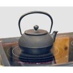 Interior view of Iwachu Tetsubin Arare Patterned Cast Iron Kettle 0.9 L with lid open