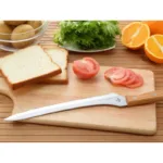 235mm Arnest Bread Slicer showing serrated blade, designed for easy daily bread slicing.