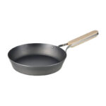 Enzo frying pan on induction stove, cooking food
