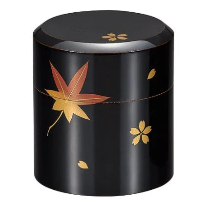Elegant Isuke Tea Caddy with maple and cherry blossom design, perfect for tea lovers