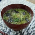Close-up of Marukome Ryotei no Aji Miso Paste with Dashi 750g, featuring red miso base