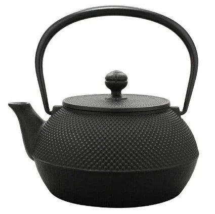 Iwachu Tetsubin Arare Patterned Cast Iron Kettle 0.9 L full view on kitchen counter